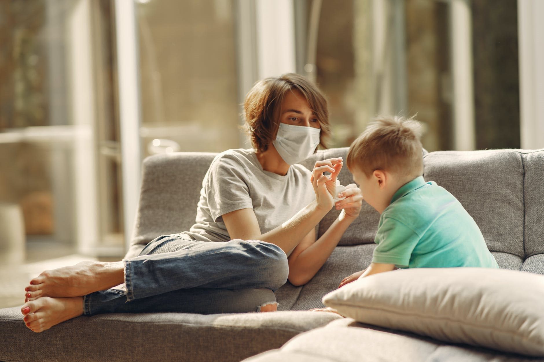 Blog - parent with child in mask_stay at home